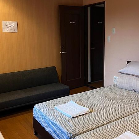 Atami Onsen Guest House Megumi Bagian luar foto
