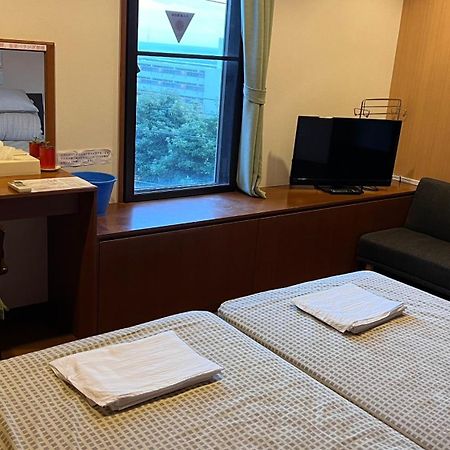 Atami Onsen Guest House Megumi Bagian luar foto