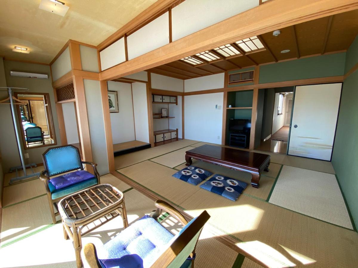 Atami Onsen Guest House Megumi Bagian luar foto