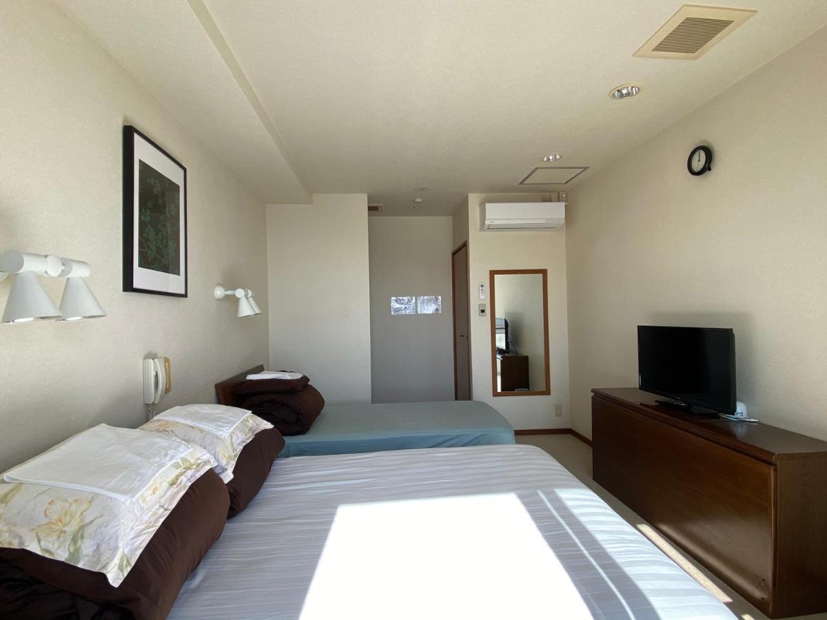 Atami Onsen Guest House Megumi Bagian luar foto