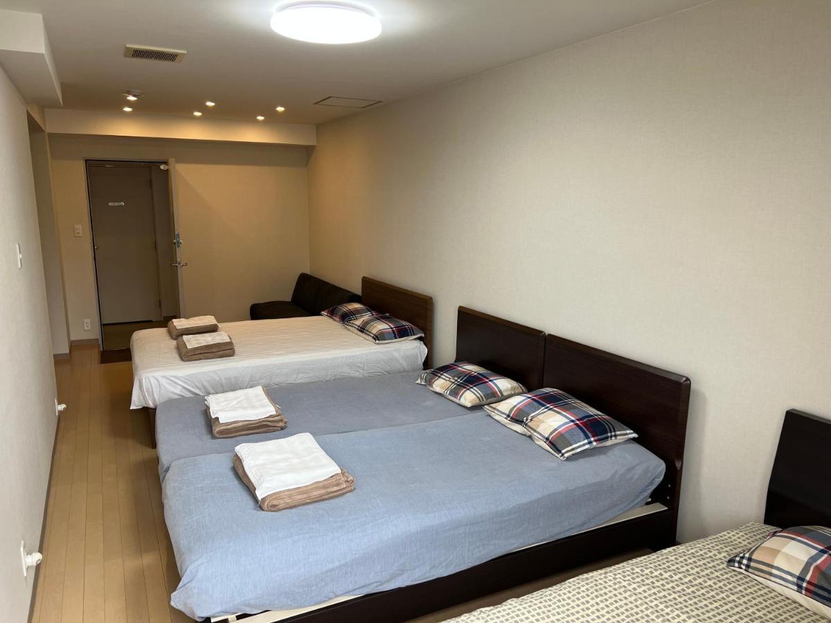Atami Onsen Guest House Megumi Bagian luar foto