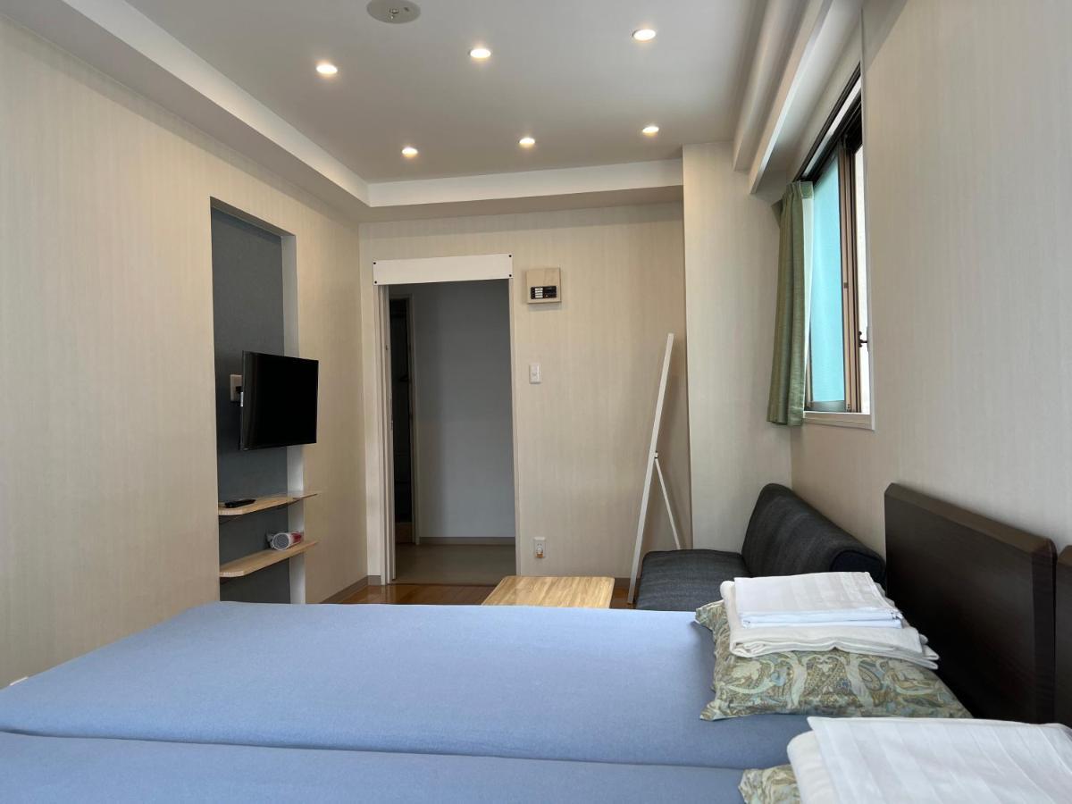 Atami Onsen Guest House Megumi Bagian luar foto