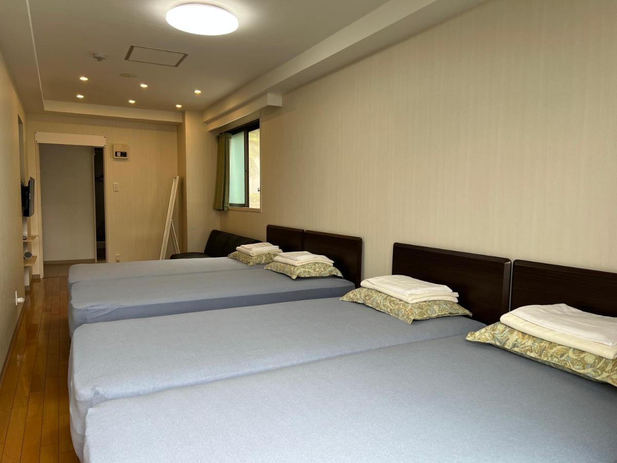 Atami Onsen Guest House Megumi Bagian luar foto