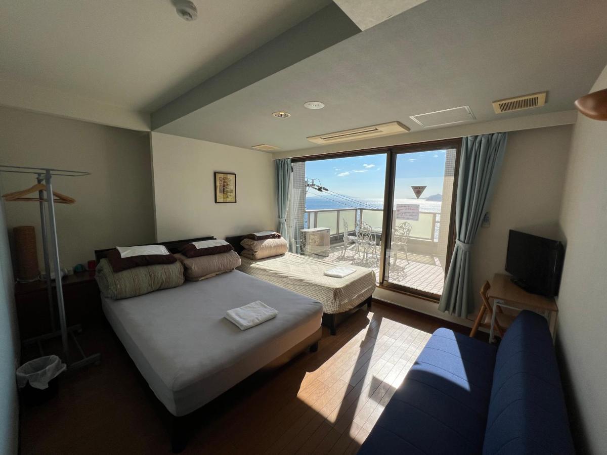 Atami Onsen Guest House Megumi Bagian luar foto