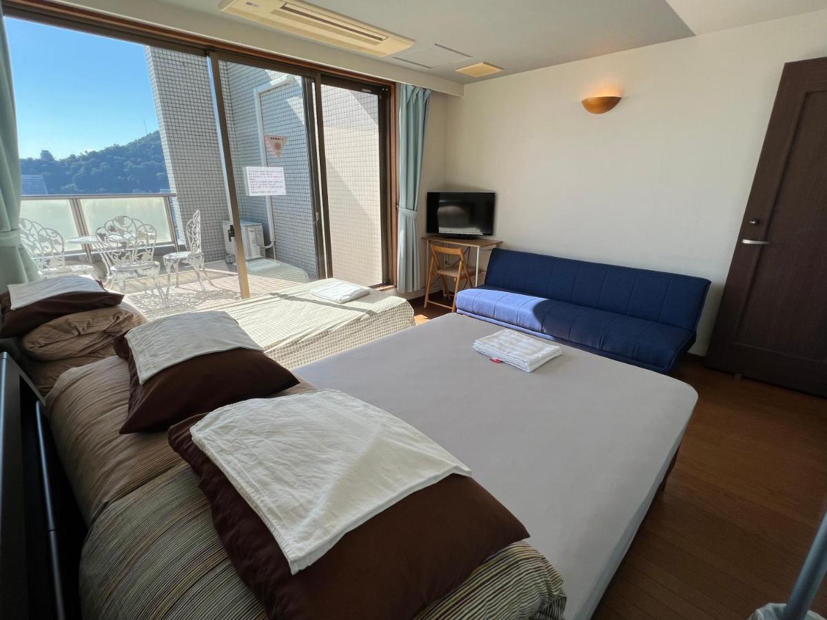 Atami Onsen Guest House Megumi Bagian luar foto