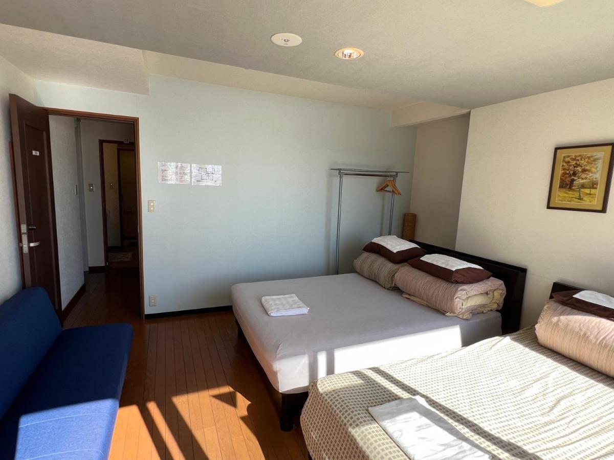 Atami Onsen Guest House Megumi Bagian luar foto