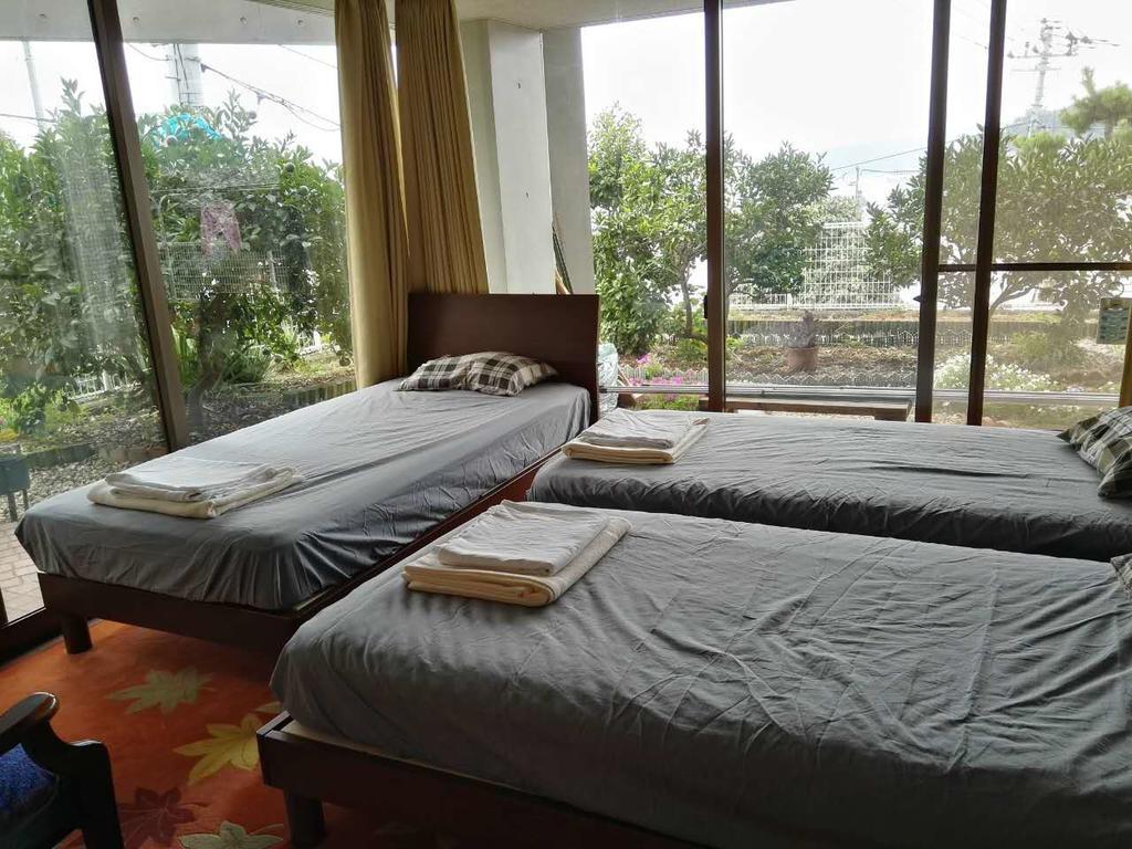 Atami Onsen Guest House Megumi Bagian luar foto